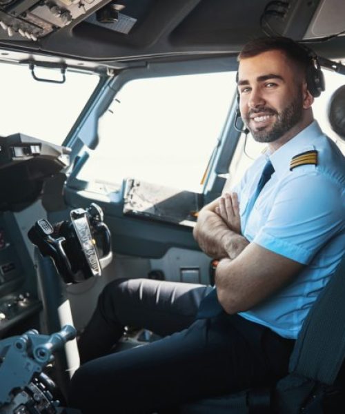 contented-pilot-looking-forward-to-the-upcoming-flight-768x512